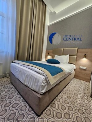 Literie de qualité supérieure, matelas mémoire de forme, minibar