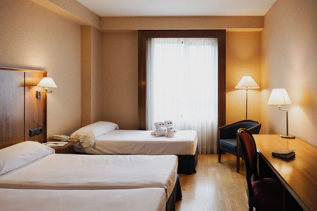 Triple Room | Minibar, in-room safe, free WiFi, bed sheets