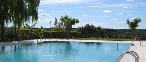Seasonal outdoor pool, sun loungers