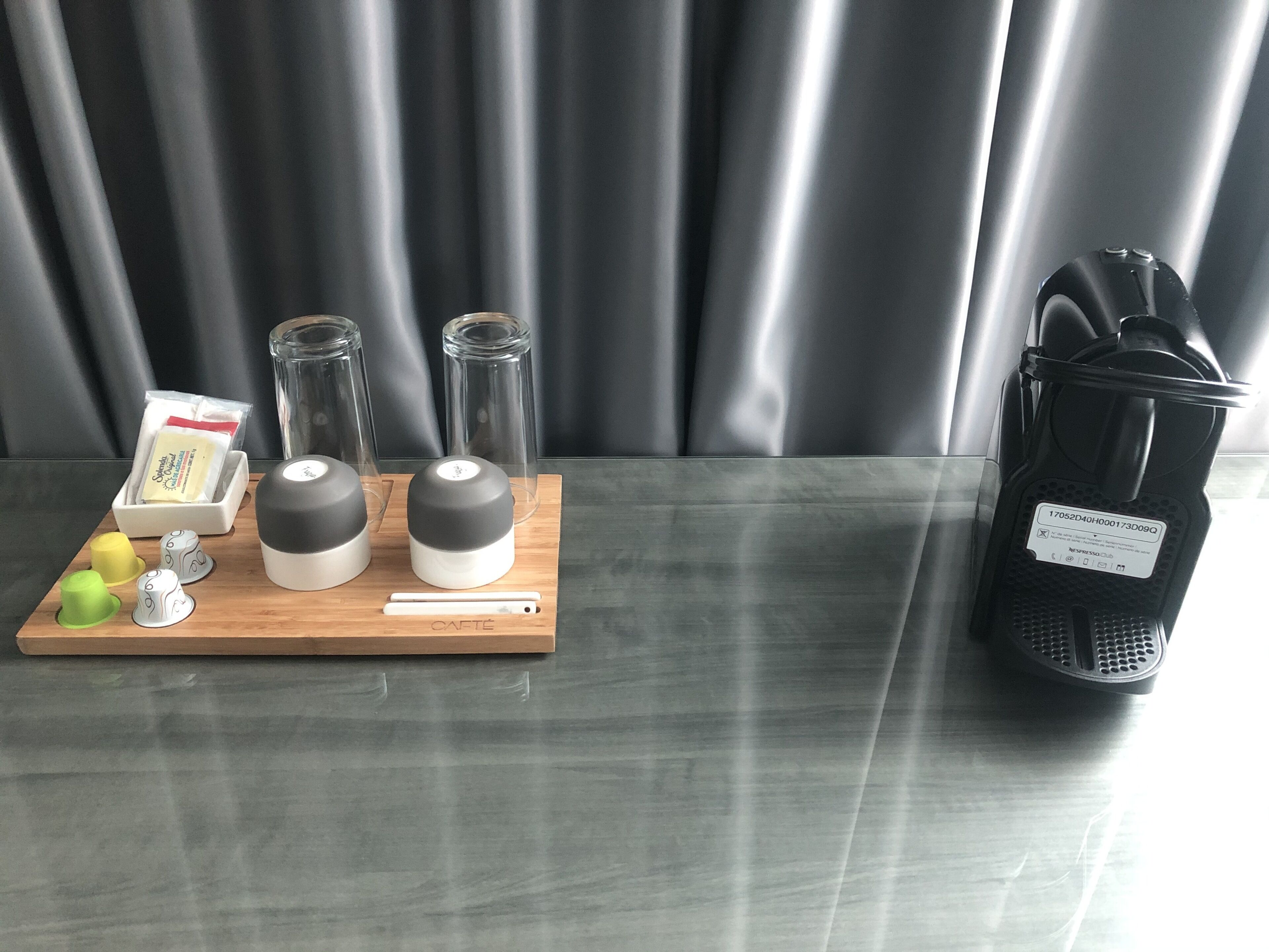 business suite with living area and street view | coffee and/or coffee maker