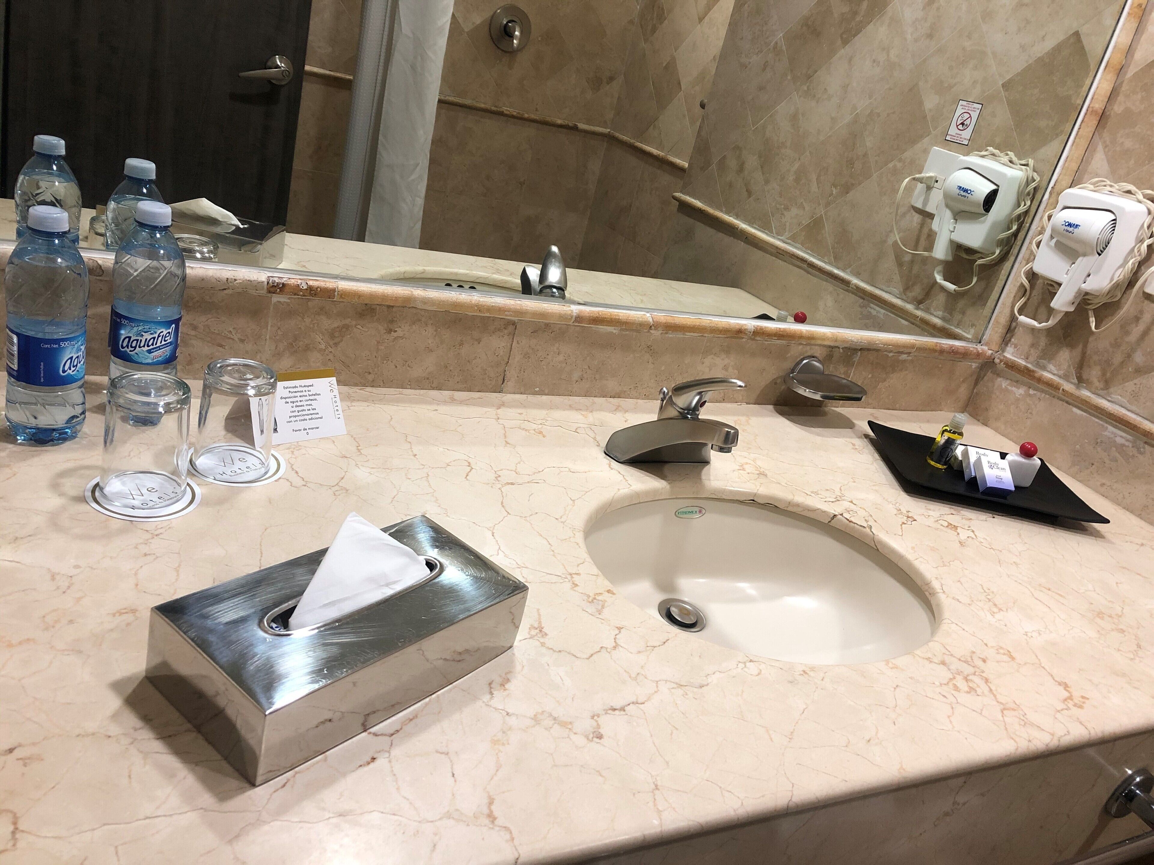 king room with internal view | bathroom | shower, free toiletries, hair dryer, towels