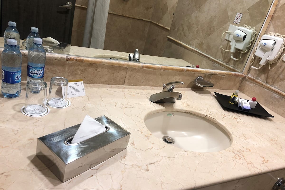 king room with internal view | bathroom | shower, free toiletries, hair dryer, towels