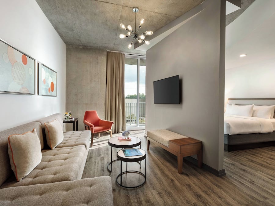 Suite, 1 Bedroom, Balcony | Living room | 37-inch flat-screen TV with satellite channels, TV, DVD player