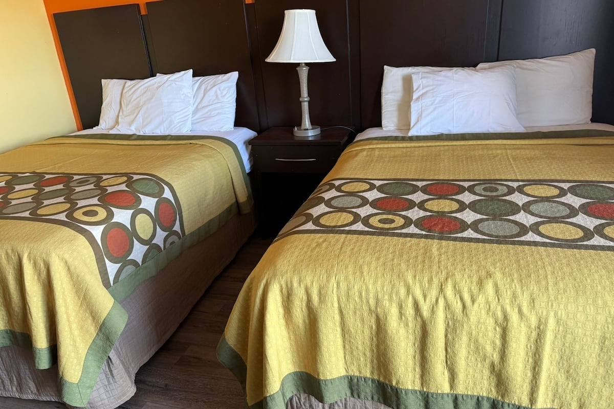 Room, 2 Double Beds, Smoking | Iron/ironing board, free WiFi, bed sheets