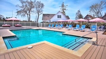 Seasonal outdoor pool, open 9:00 AM to 9:00 PM, pool loungers