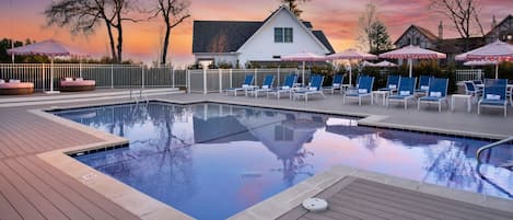 Seasonal outdoor pool, open 9:00 AM to 9:00 PM, pool loungers