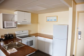 Suite, Multiple Beds, Non Smoking, Kitchenette | Free WiFi, bed sheets