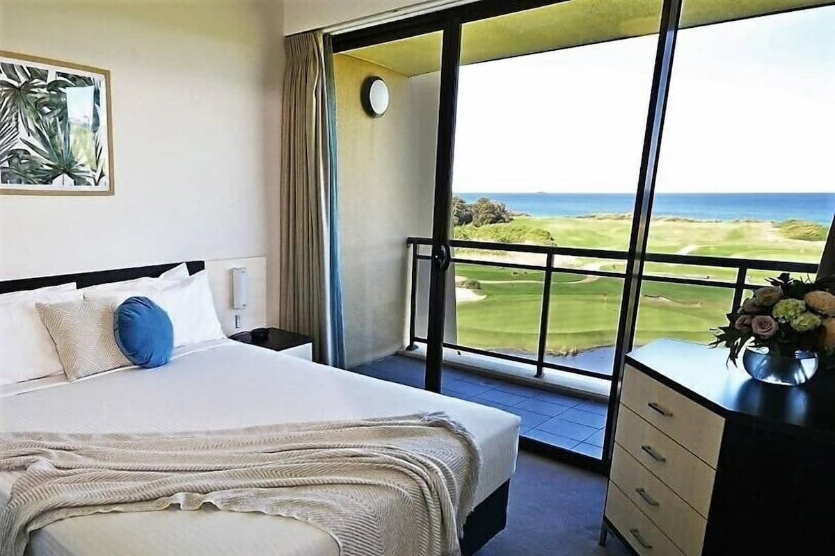 Suite, 1 Queen Bed, Balcony, Ocean View | Iron/ironing board, Internet, bed sheets