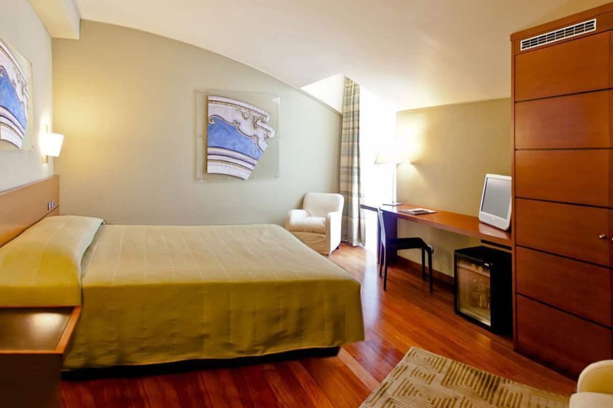 Down duvets, minibar, in-room safe, desk