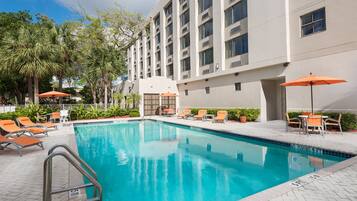 Outdoor pool, open 8 AM to 8:00 PM, pool umbrellas, pool loungers