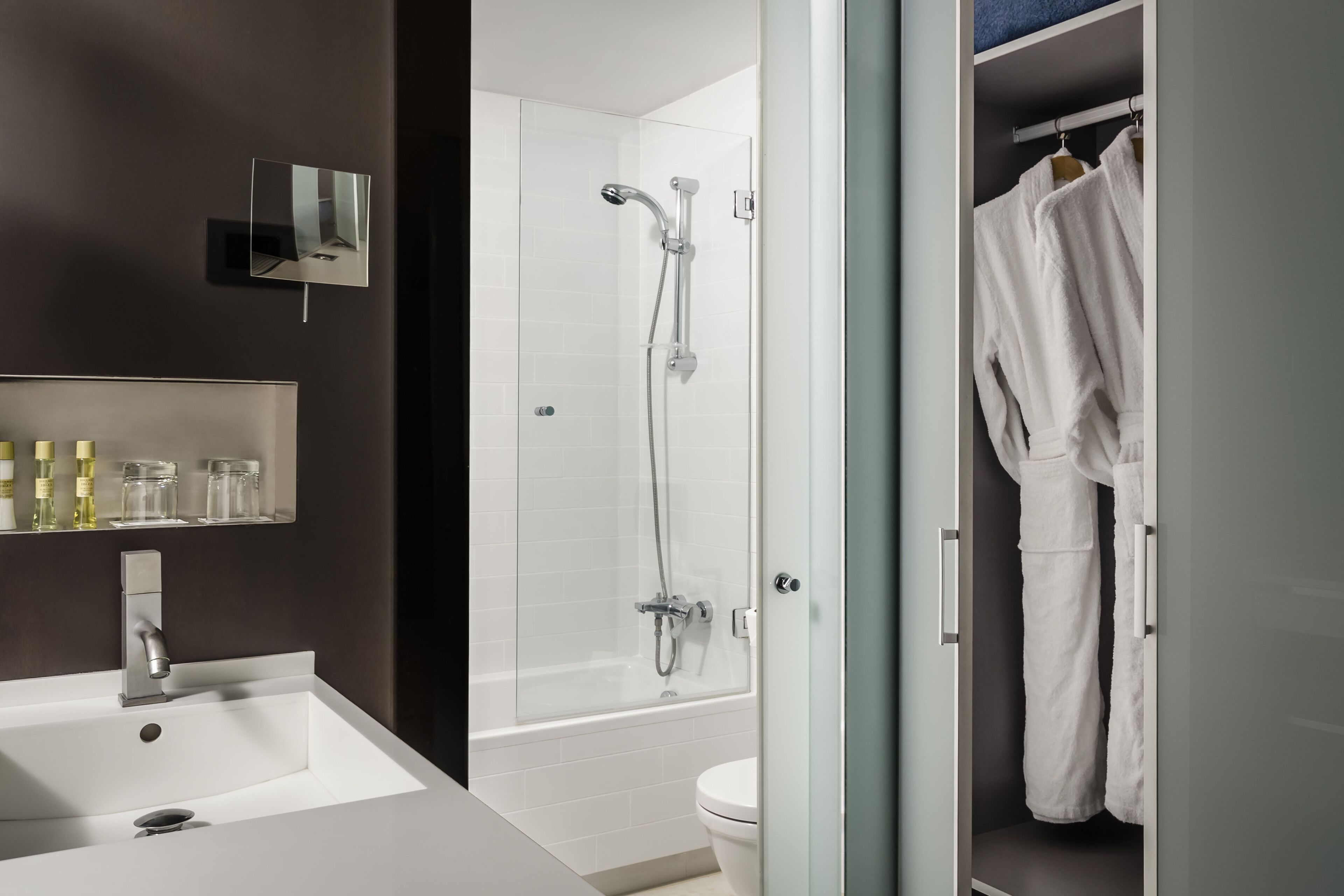 eco-friendly toiletries, hair dryer, towels