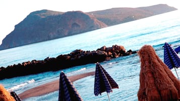 On the beach, sun loungers
