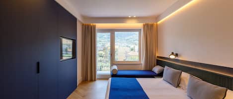 Kamar Double atau Twin Deluks | Minibar, brankas, meja kerja, dan ruang kerja ramah laptop