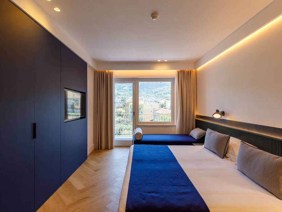 Chambre Deluxe Double ou avec lits jumeaux | Minibar, coffres-forts dans les chambres, bureau