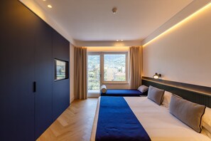 Chambre Deluxe double ou avec lits jumeaux | Minibar, coffre-fort, bureau