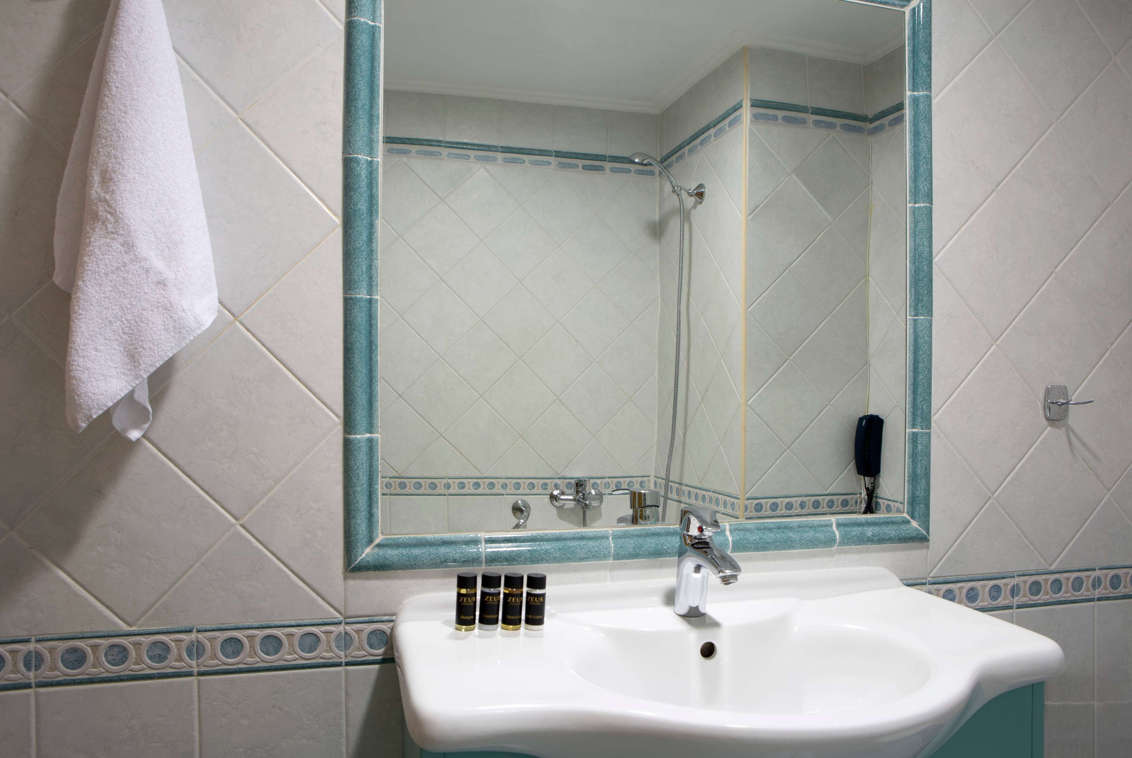 superior room | bathroom | bathtub, deep-soaking bathtub, eco-friendly toiletries, hair dryer