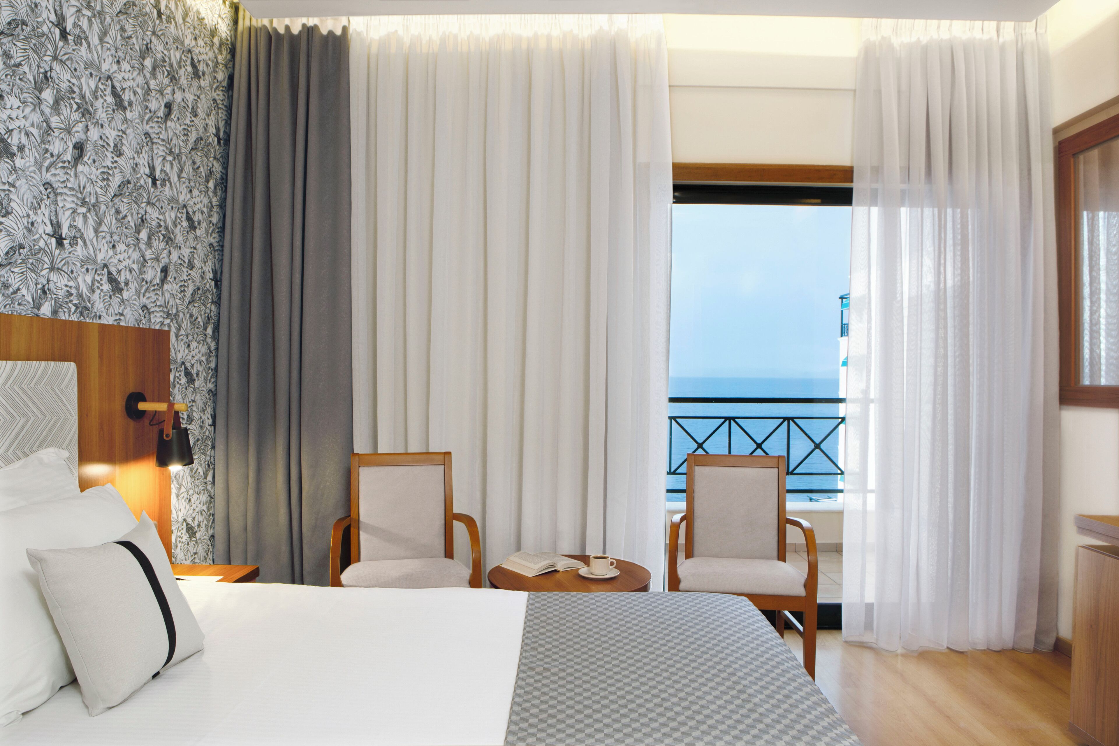 premium suite, 2 bedrooms, partial sea view | 1 bedroom, in-room safe, desk, soundproofing