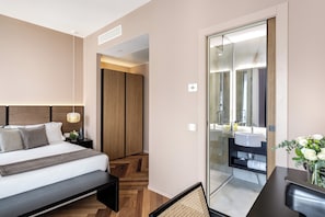 Quarto executivo, vista para a cidade | Roupas de cama antialérgicas, frigobar, cofres nos quartos, escrivaninha