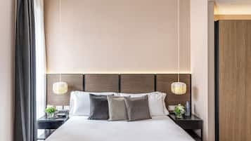 Executive kamer, uitzicht op stad | Hypoallergeen beddengoed, een minibar, een kluis op de kamer, een bureau