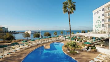 Outdoor pool, open 10:00 AM to 6:00 PM, pool umbrellas, pool loungers