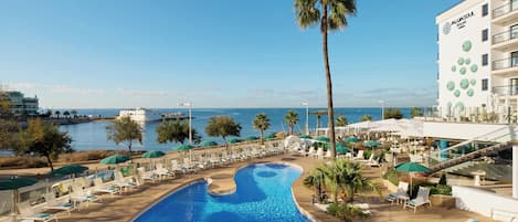 Outdoor pool, open 10:00 AM to 6:00 PM, pool umbrellas, pool loungers