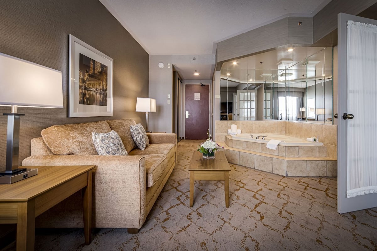 Premium bedding, down duvets, pillow-top beds, in-room safe