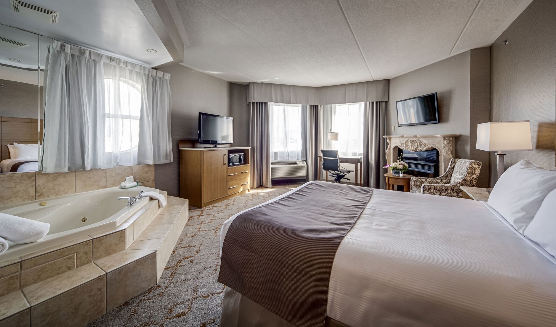 Premium bedding, down duvets, pillow-top beds, in-room safe