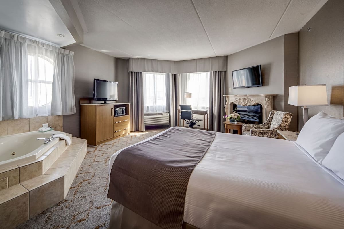 Premium bedding, down duvets, pillow-top beds, in-room safe