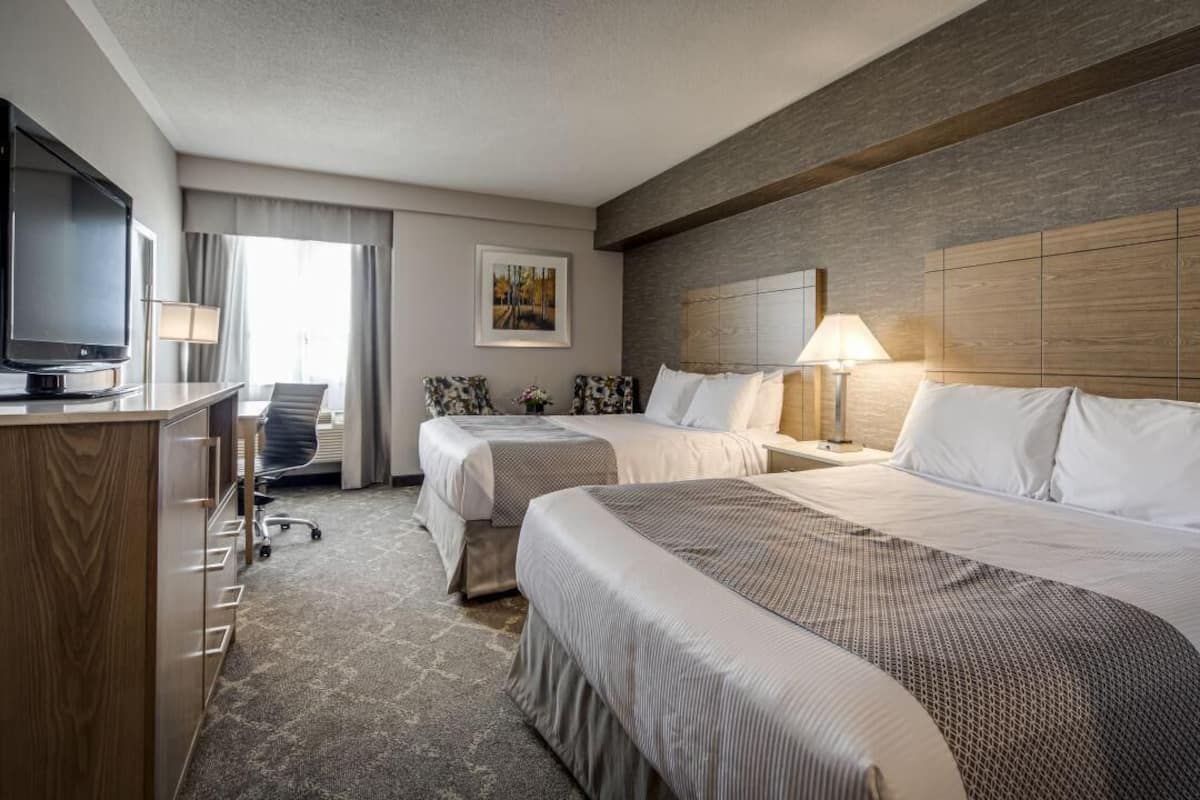 Premium bedding, down duvets, pillow-top beds, in-room safe