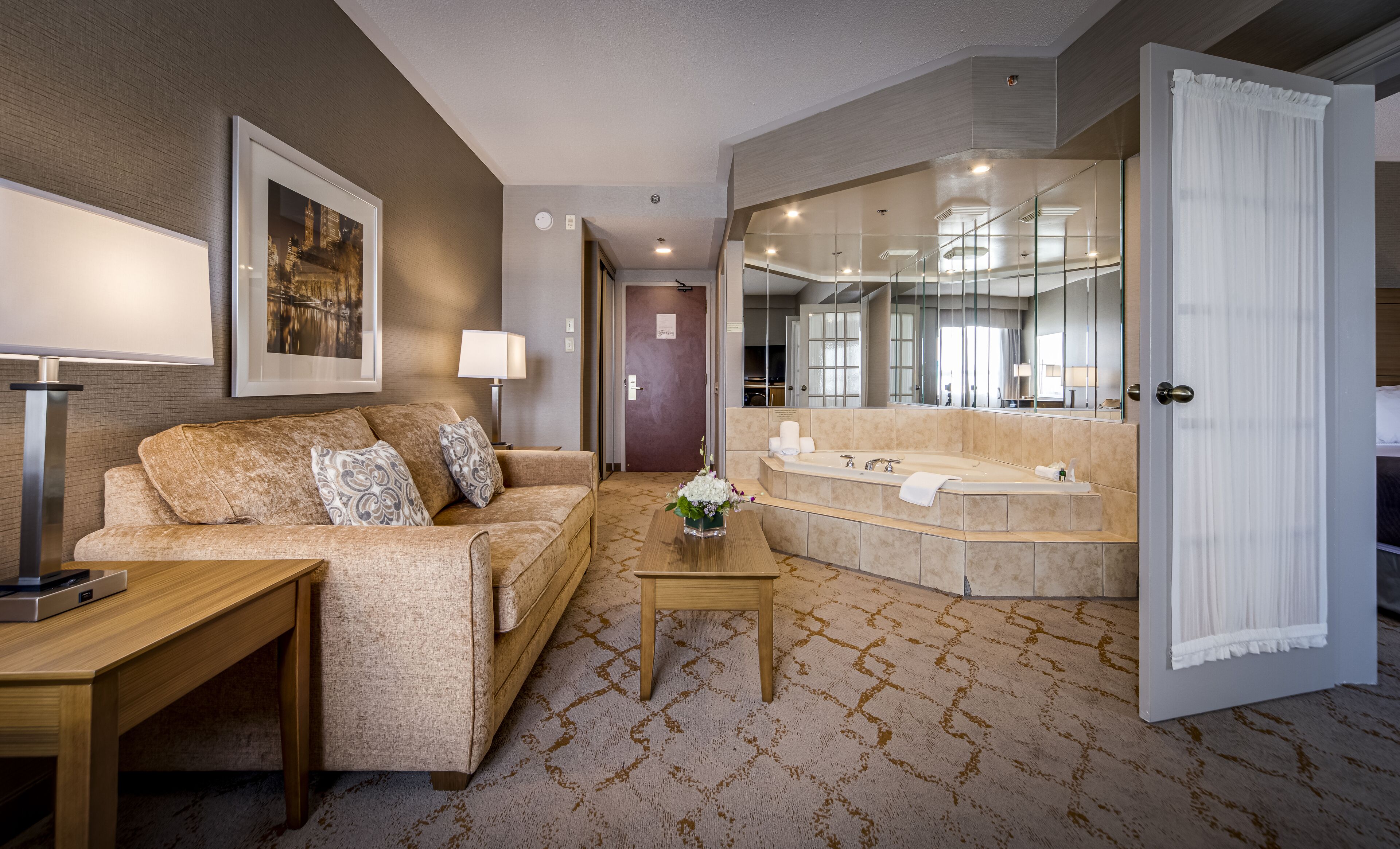 deluxe king suite with jetted tub-separate living room | 1 bedroom, premium bedding, down duvets, pillow-top beds