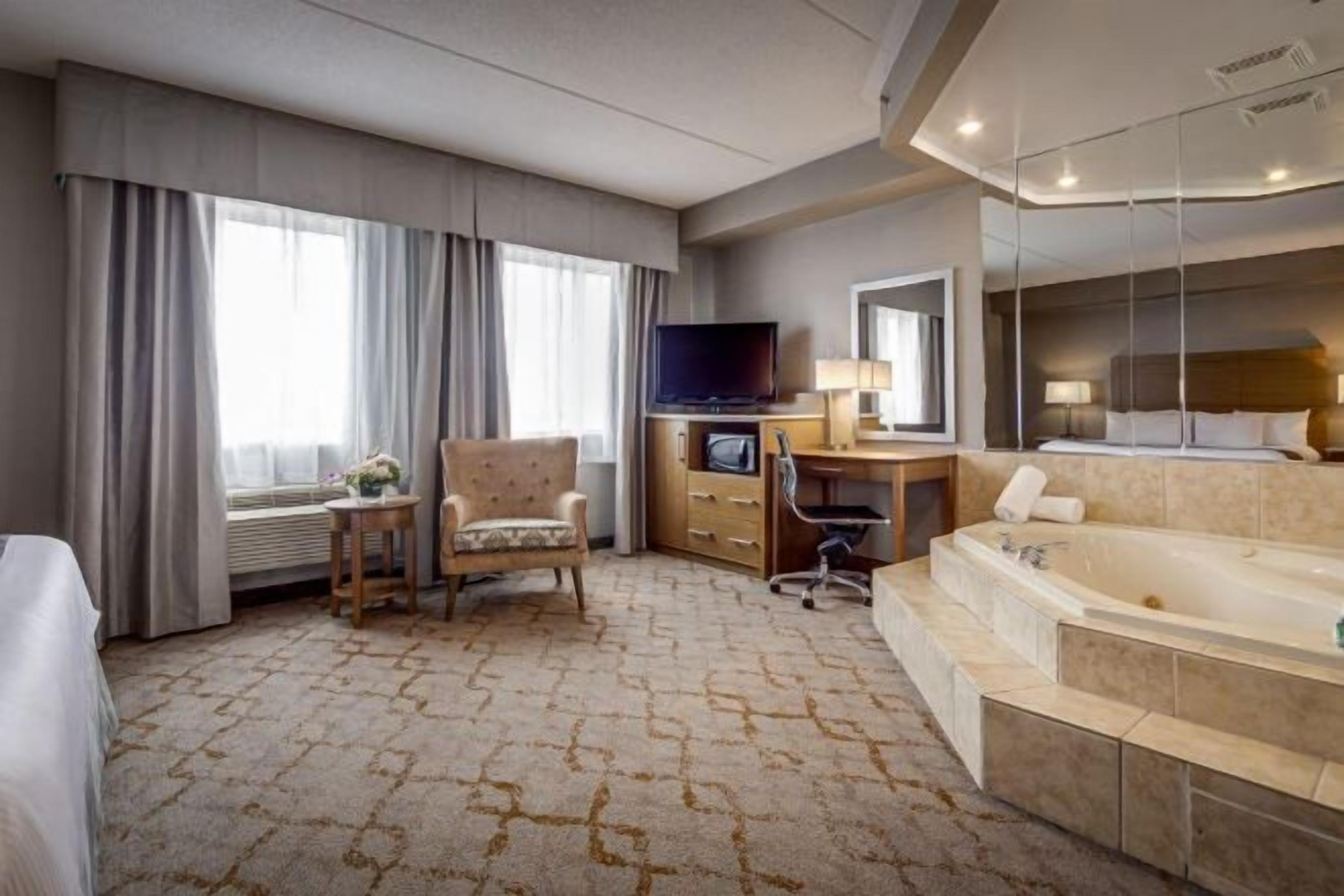 Premium bedding, down duvets, pillow-top beds, in-room safe