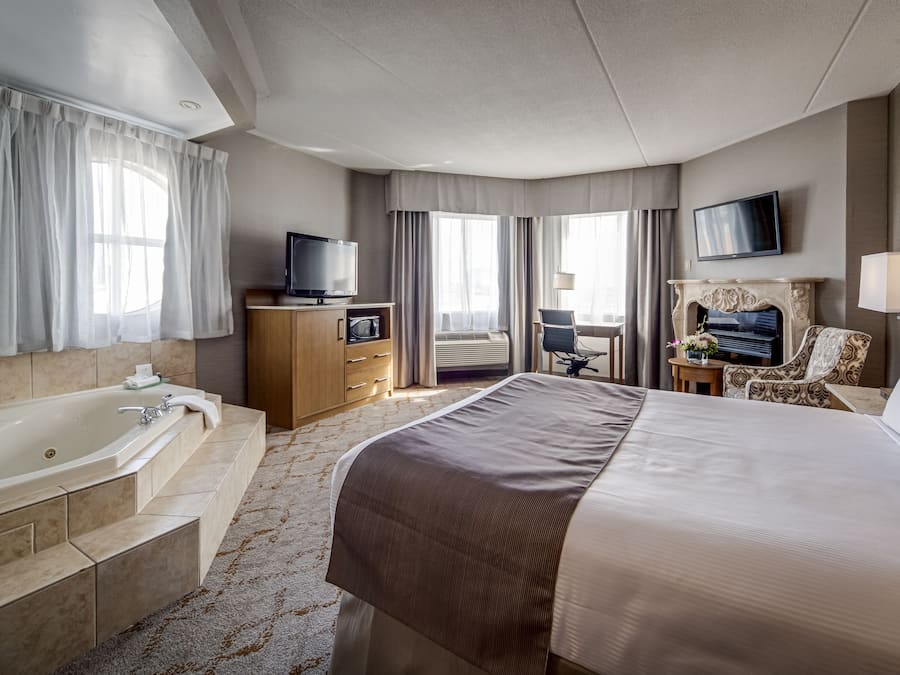 Quarto luxo, 1 cama Queen | Roupas de cama premium, edredons de pluma, camas com colchões pillow-top