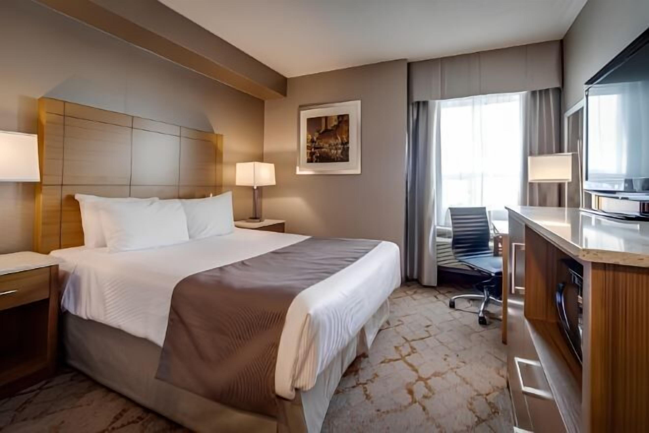 Premium bedding, down duvets, pillow-top beds, in-room safe