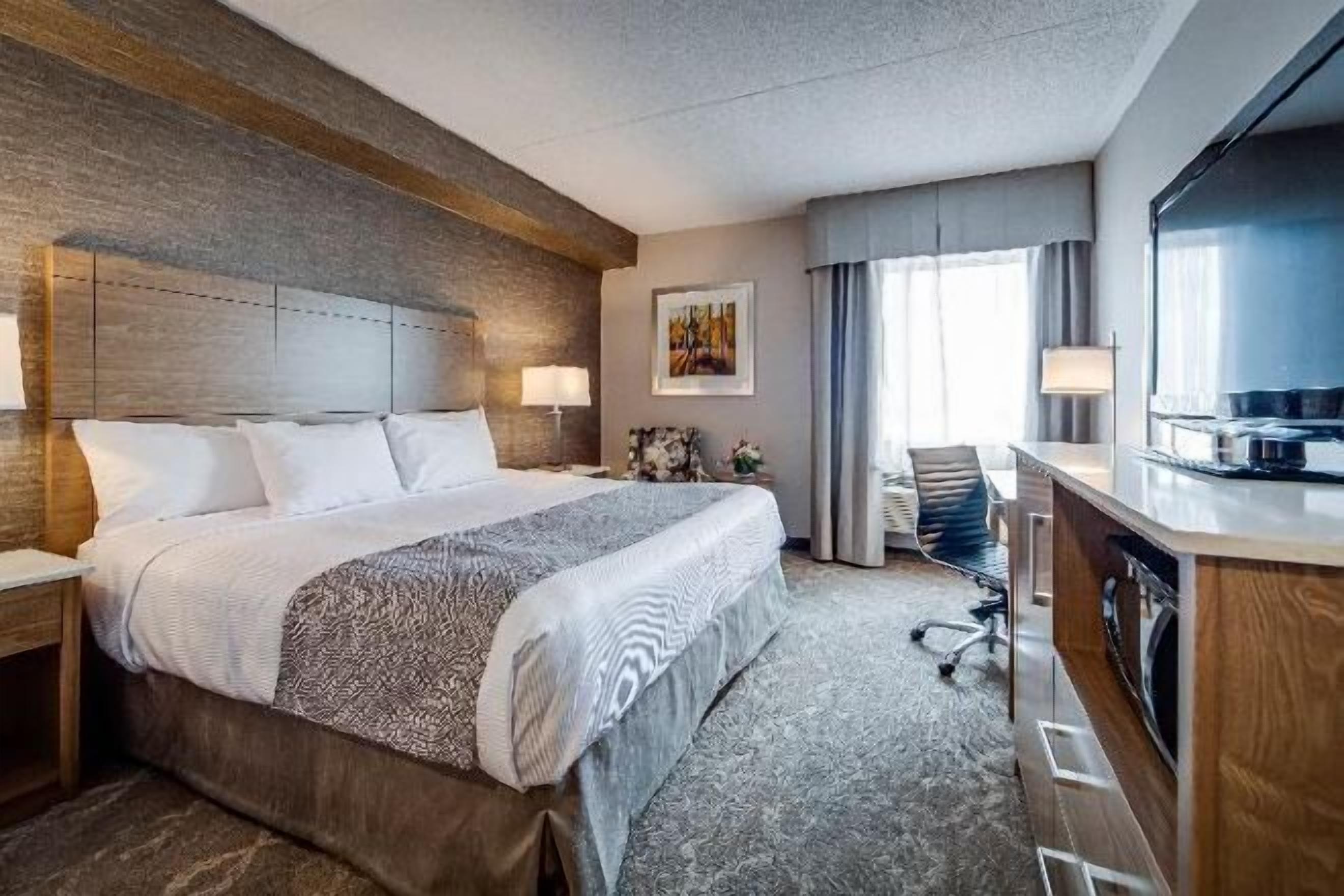 Premium bedding, down duvets, pillow-top beds, in-room safe