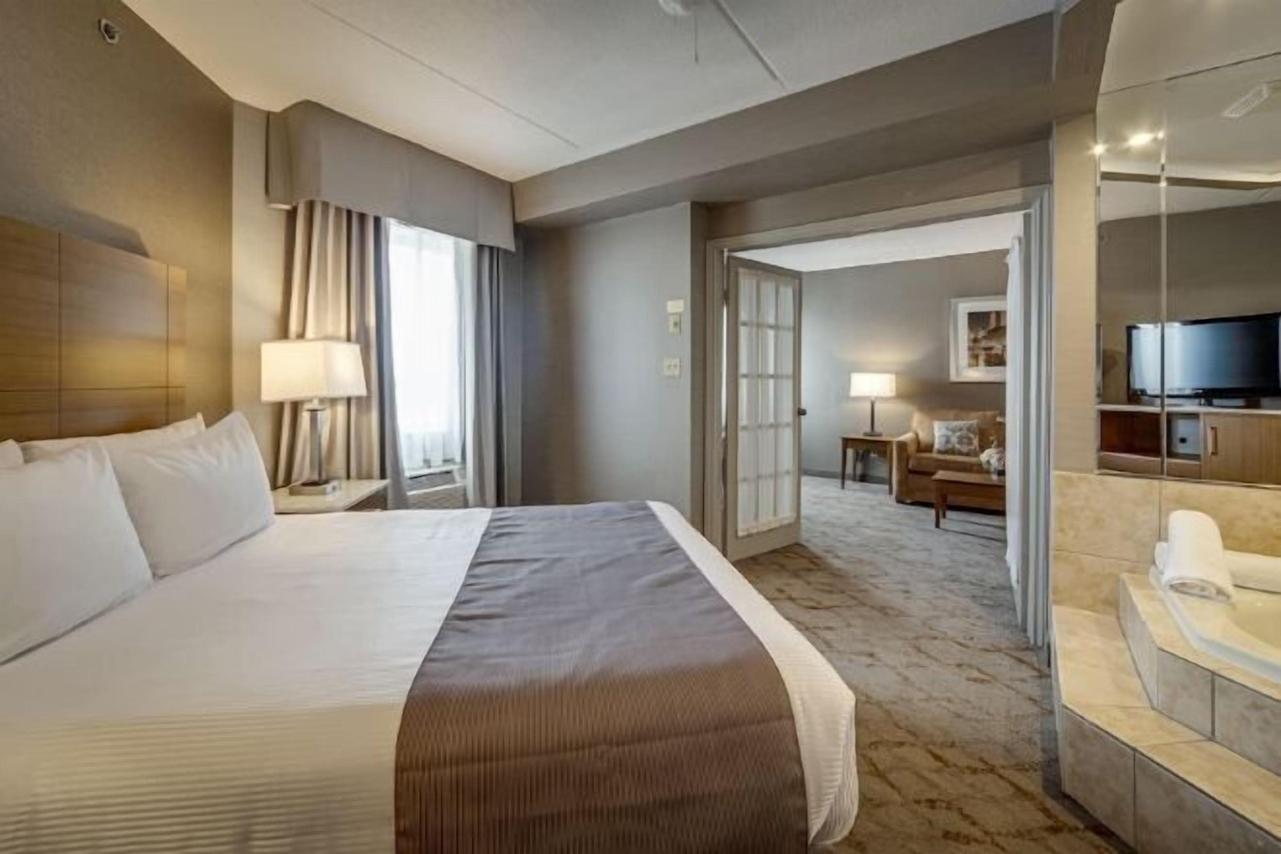 Premium bedding, down duvets, pillow-top beds, in-room safe