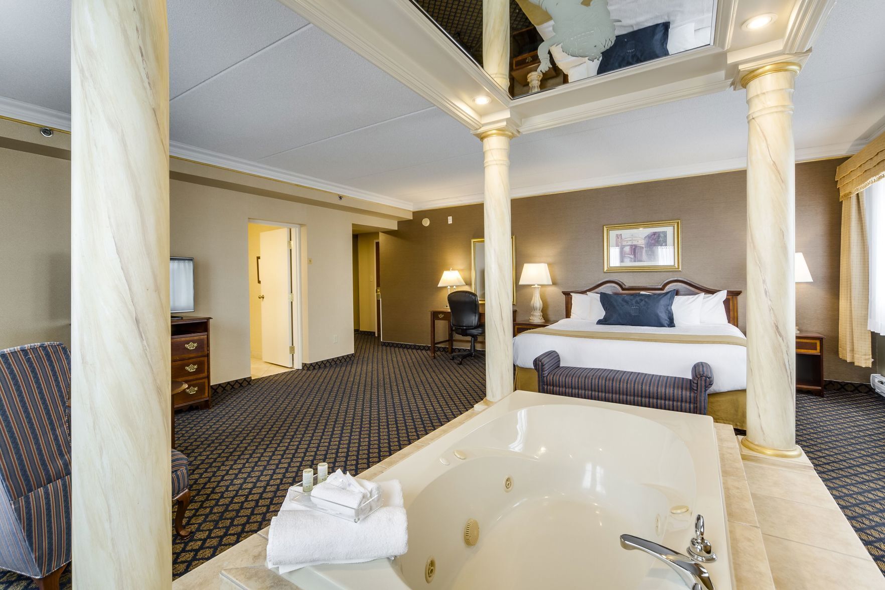 Premium bedding, down duvets, pillow-top beds, in-room safe