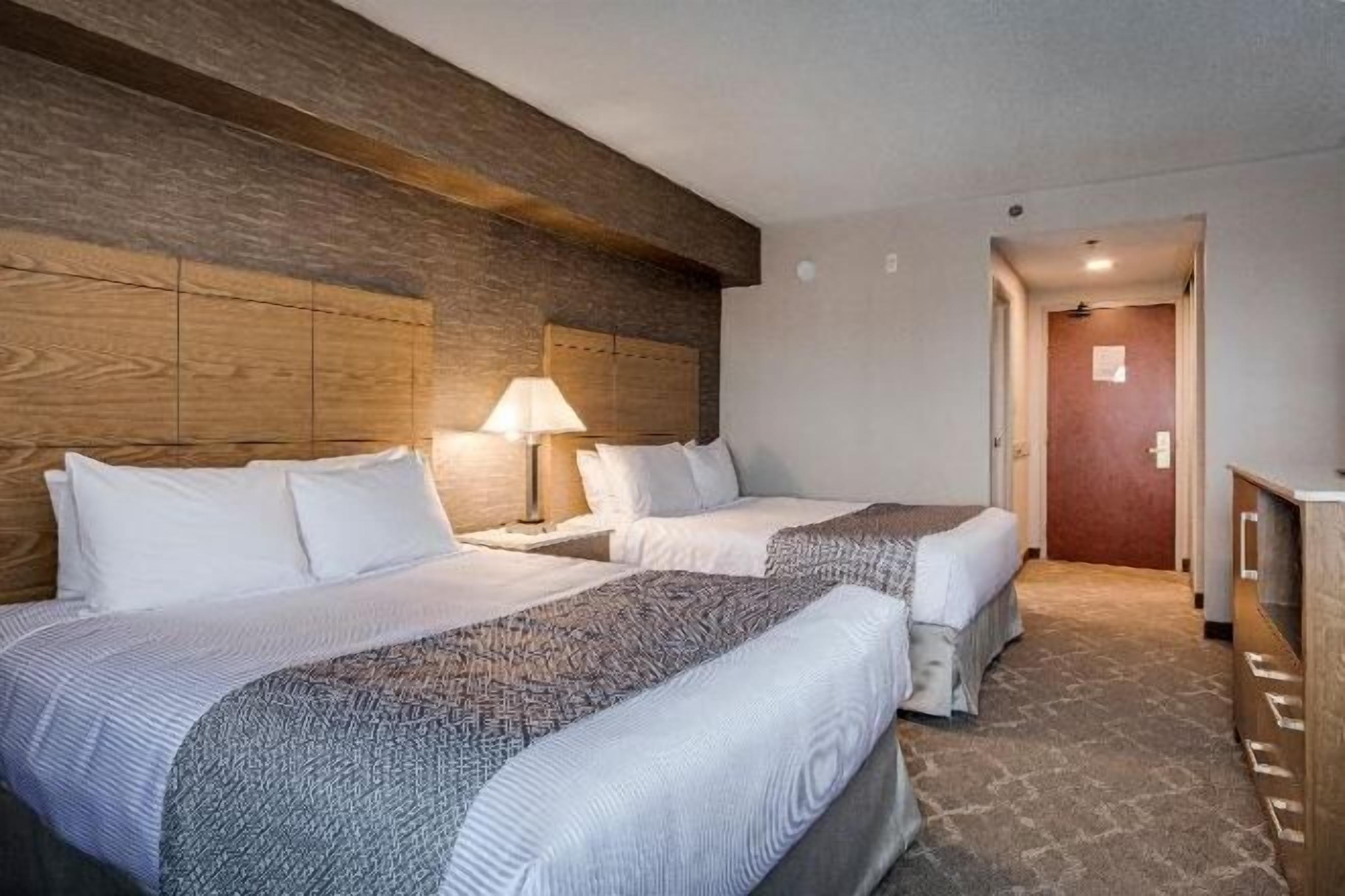 Premium bedding, down duvets, pillow-top beds, in-room safe