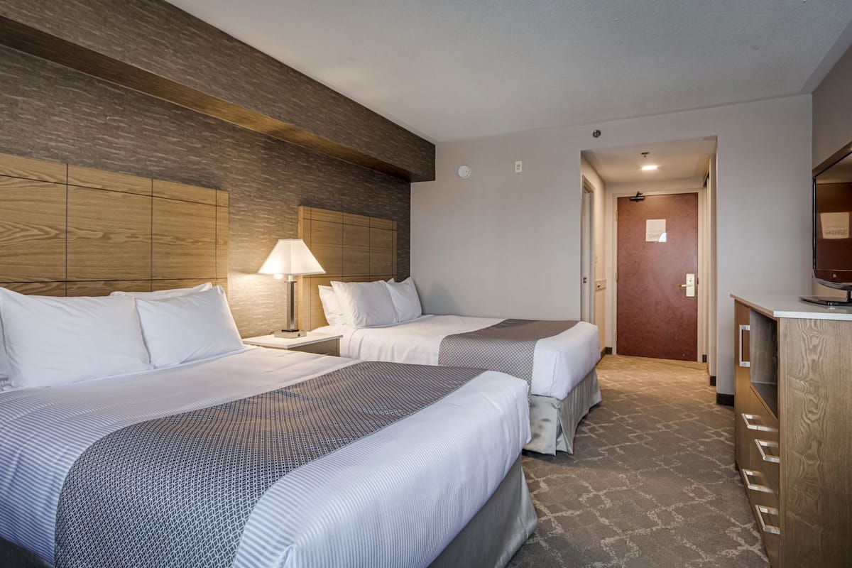 Premium bedding, down duvets, pillow-top beds, in-room safe