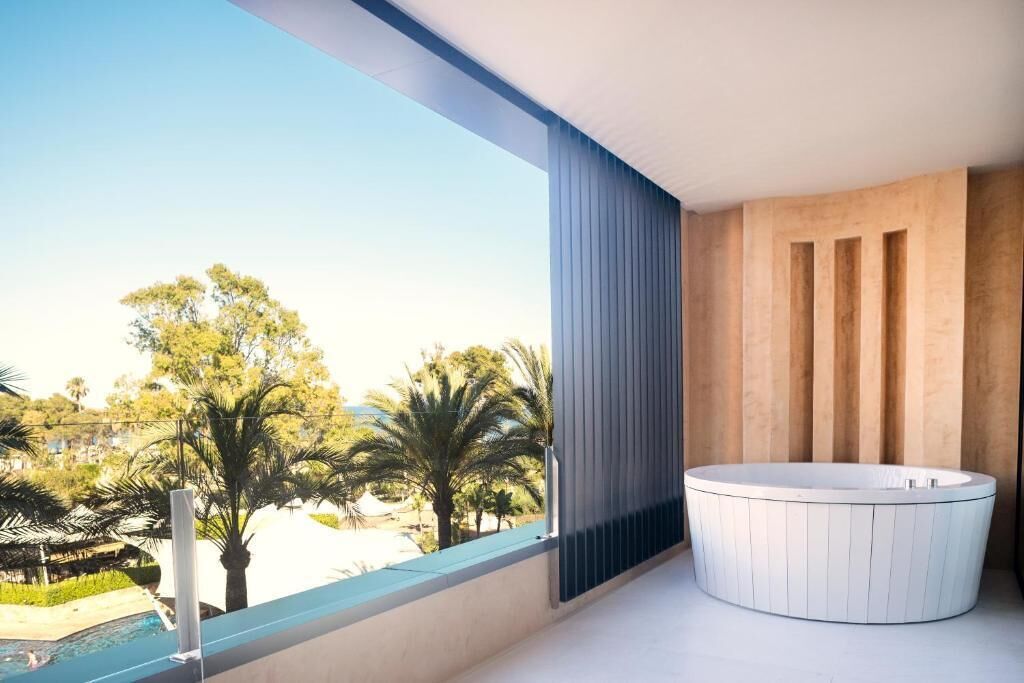 Luxury Suite, Hot Tub | Bathroom | Combined shower/tub, deep soaking tub, designer toiletries, hair dryer