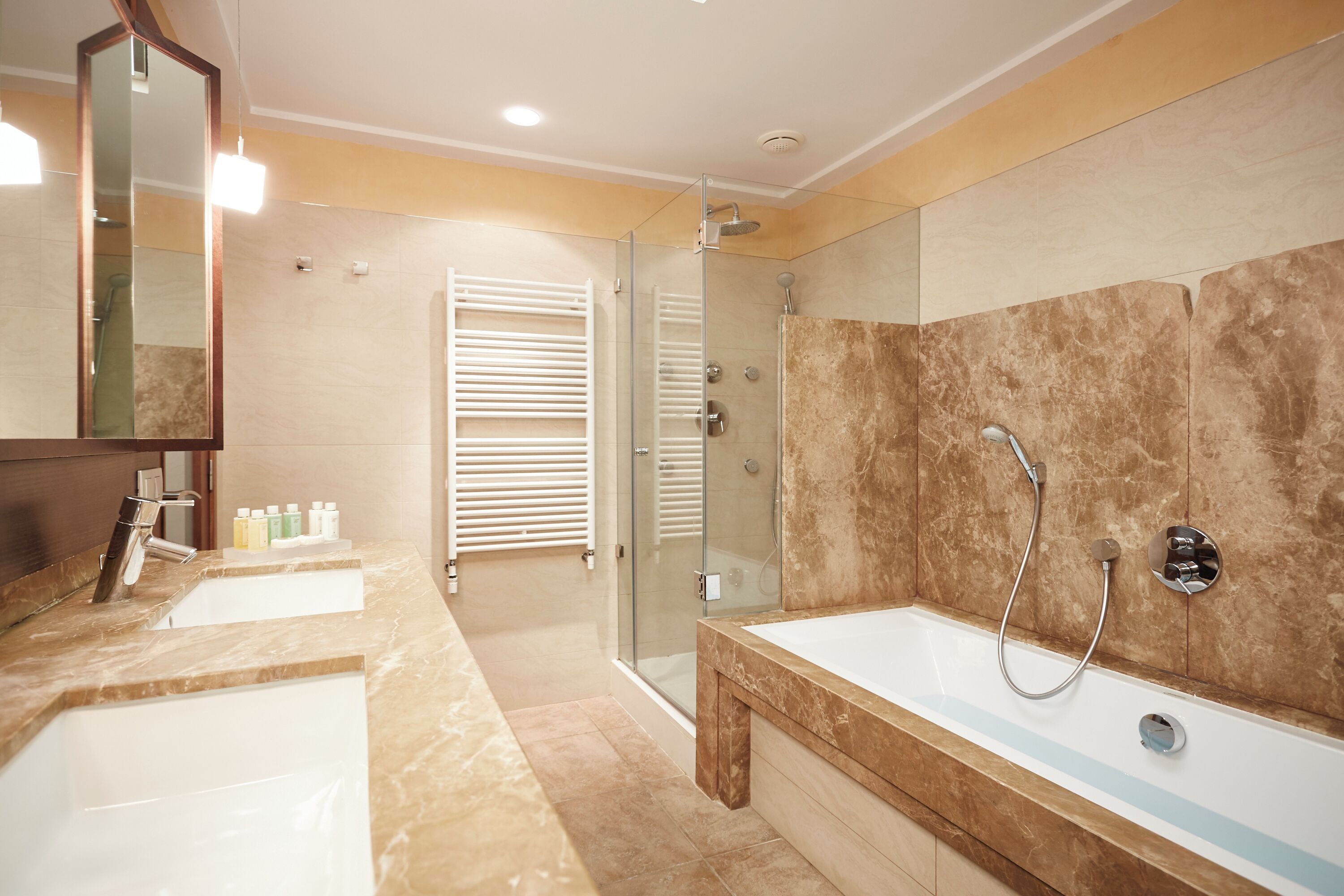 combined shower/bathtub, deep-soaking bathtub, designer toiletries