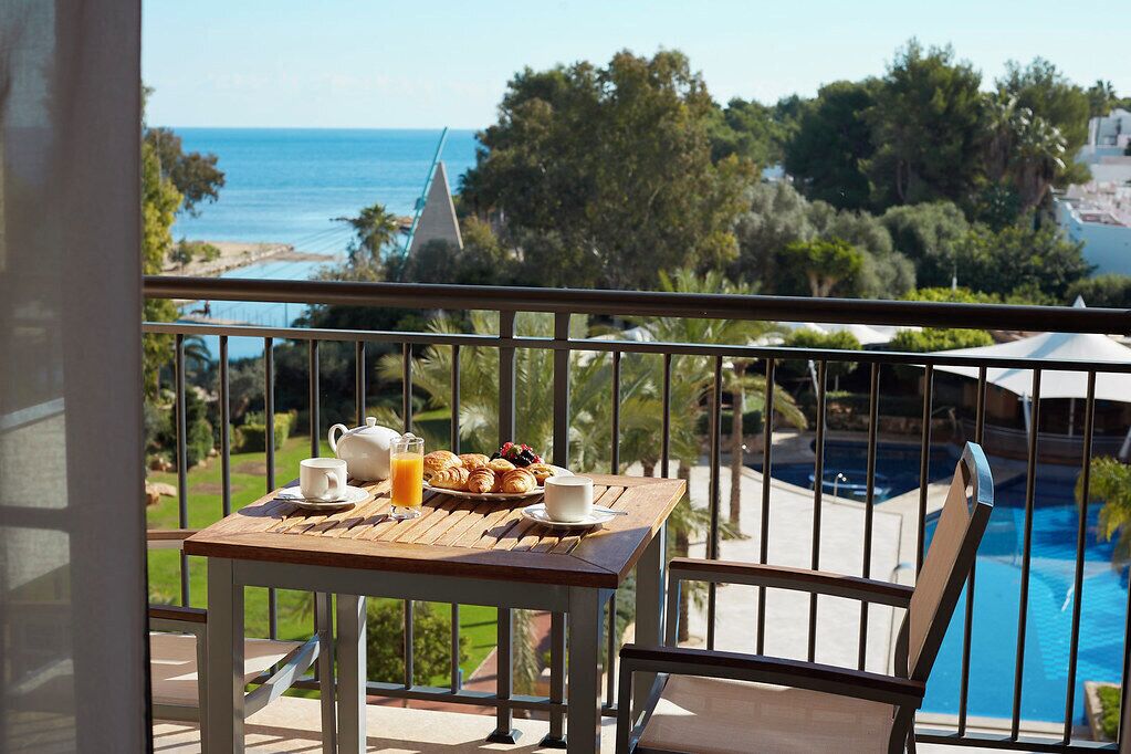Junior Suite, Balcony | Premium bedding, down comforters, minibar, in-room safe