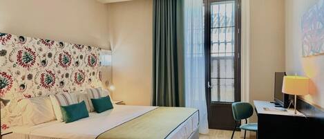 Down duvets, minibar, in-room safe, desk