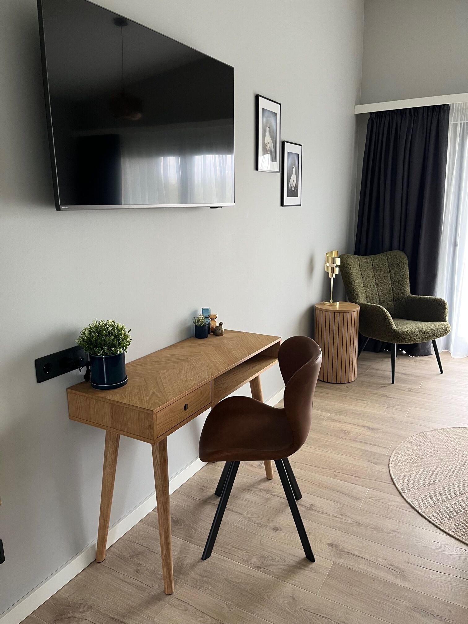 deluxe double room | living area | 30-inch smart tv with satellite channels, heated floors