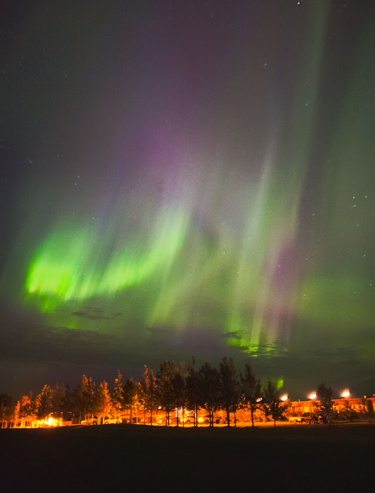 A night sky with the aurora borealis.