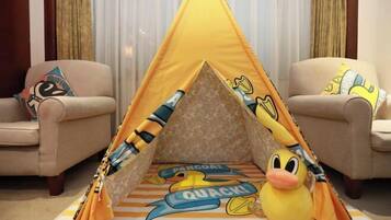 A tent with cartoon duck characters and the words "Pancake" and "Quack!" on the floor.
