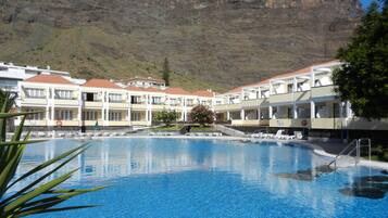 Standard Apartment, 1 Bedroom | Pool | Outdoor pool, open 10:00 AM to 6:00 PM, pool umbrellas, pool loungers