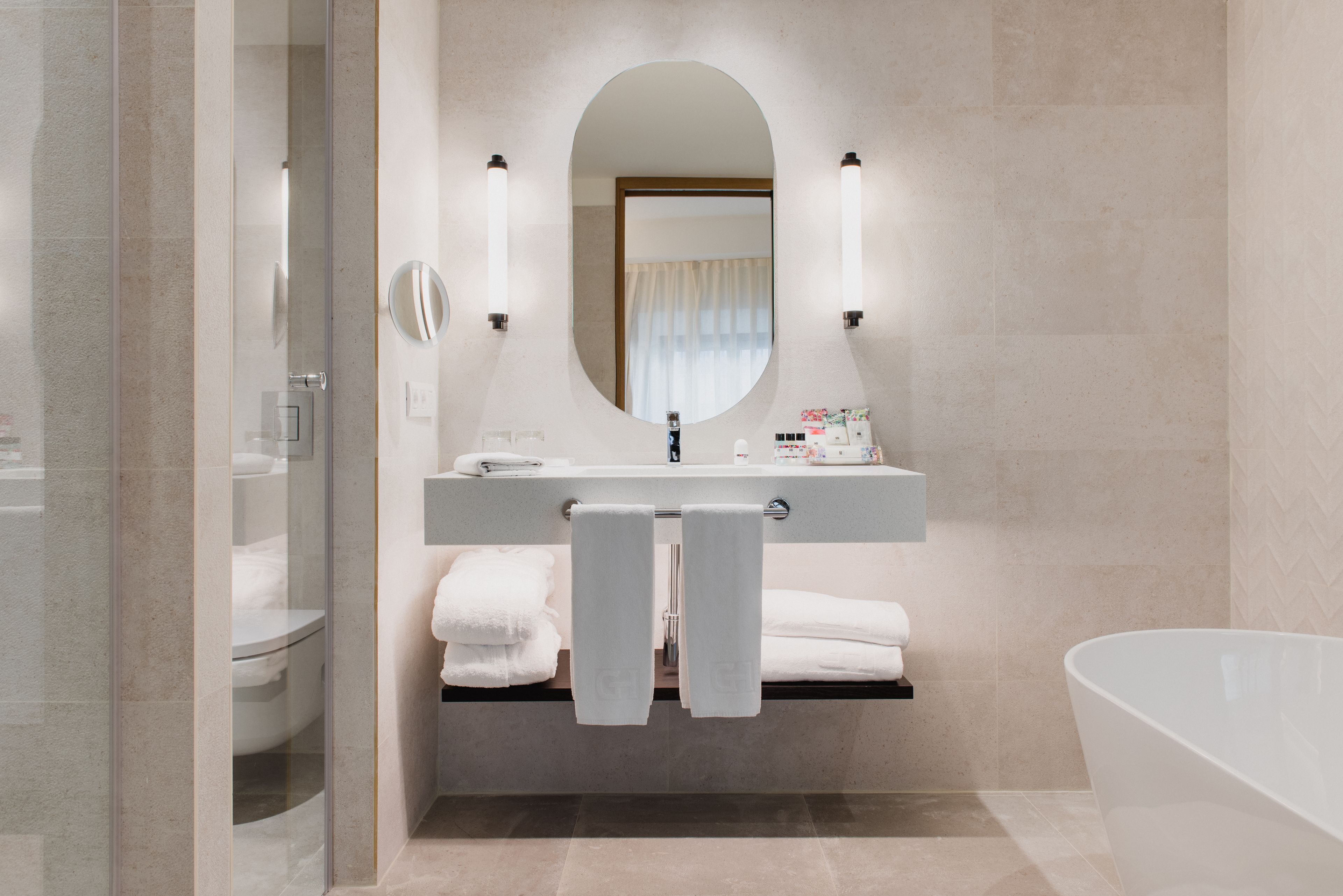 junior suite | bathroom | designer toiletries, hair dryer, slippers, bidet
