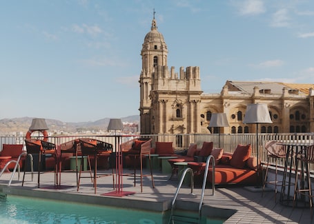 Outdoor pool, open 10 AM to 8 PM, pool umbrellas, sun loungers