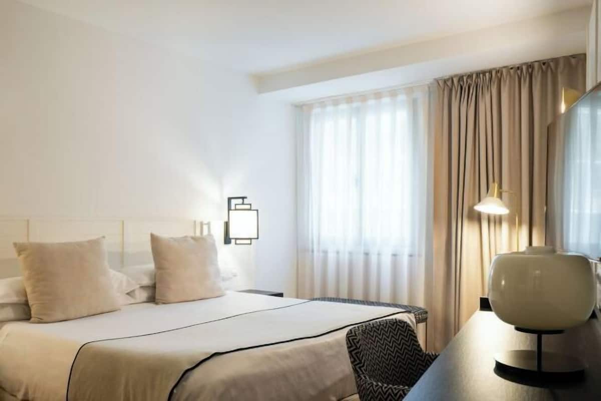 Down duvets, minibar, in-room safe, desk