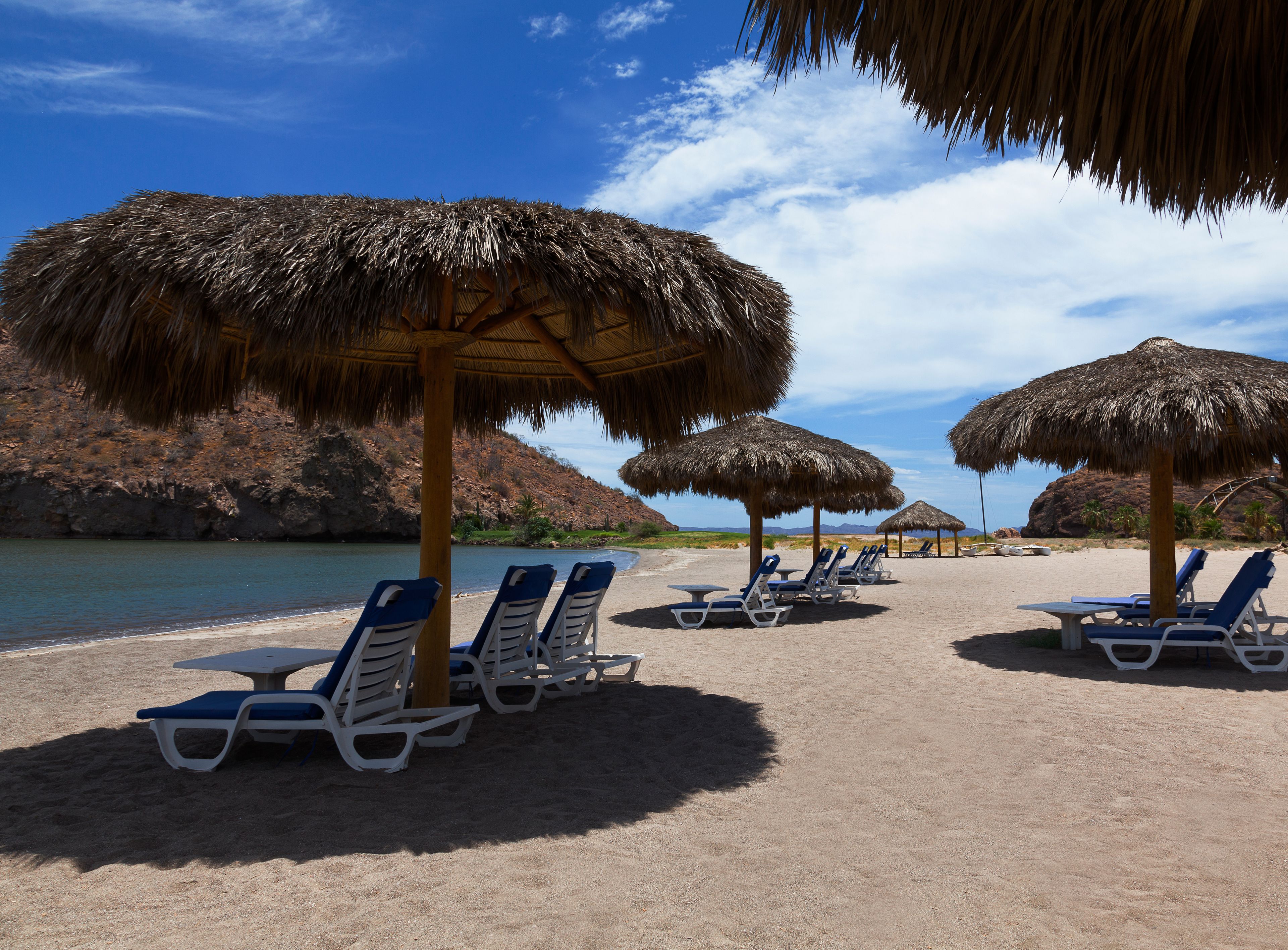 On the beach, sun-loungers, beach umbrellas, beach massages